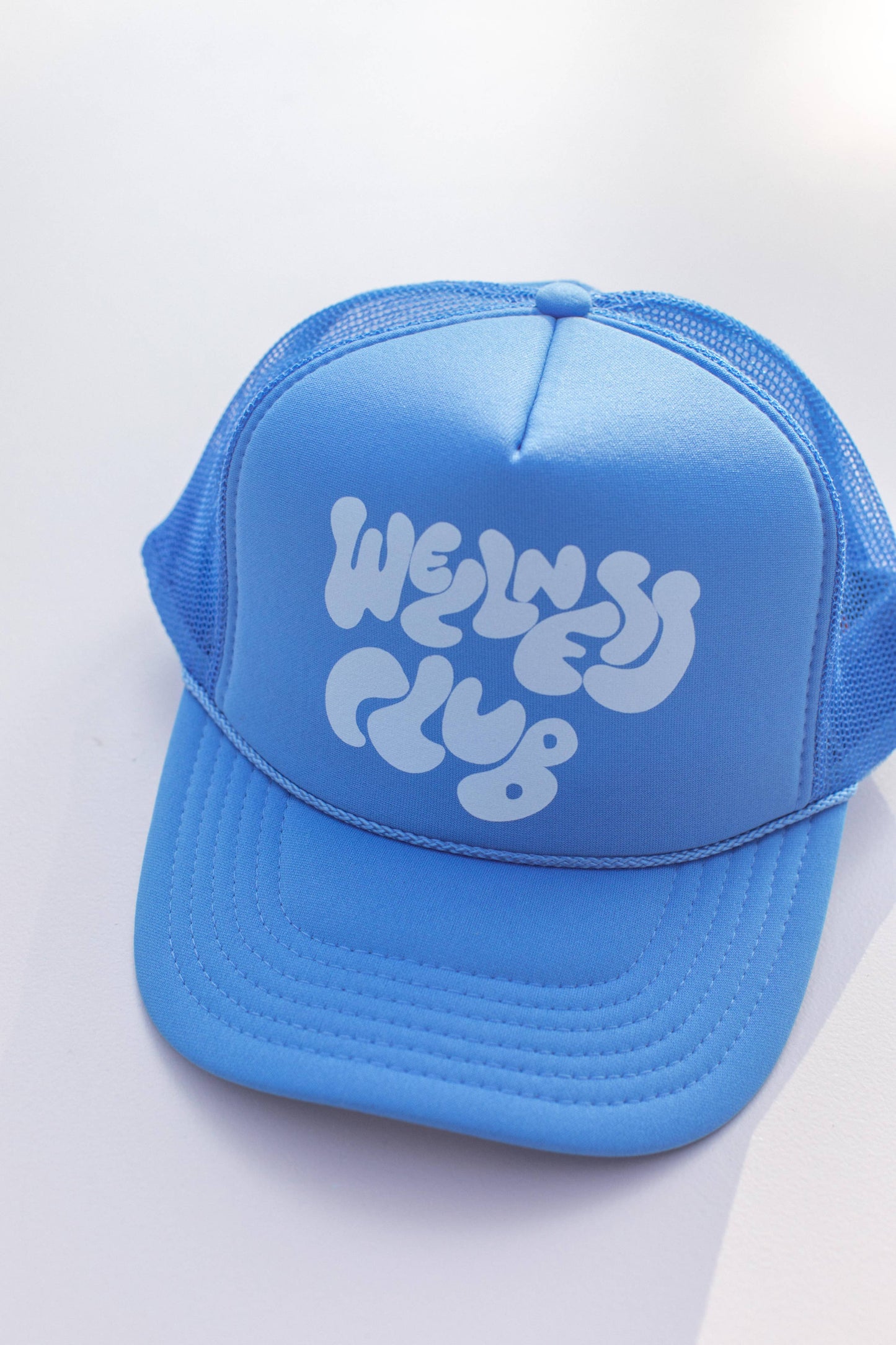 Wellness Club Yoga Pilates Trucker Hat: College Blue