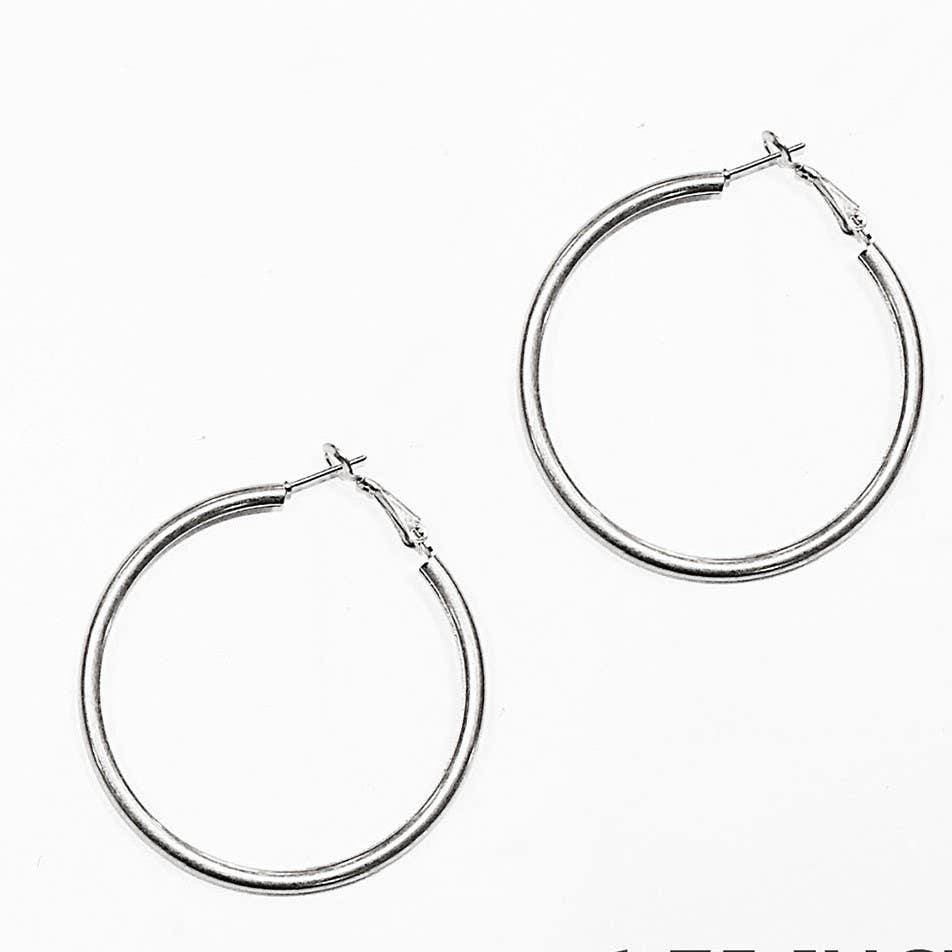 Worn Silver Hoop 2.5" Earing